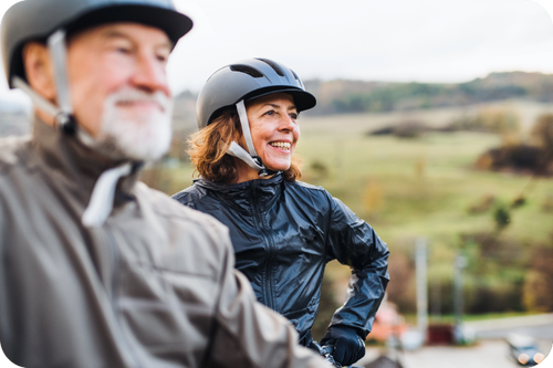 Couple biking outdoors on a cloudy day-1