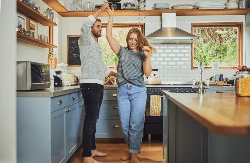 Couple Dancing In Kitchen