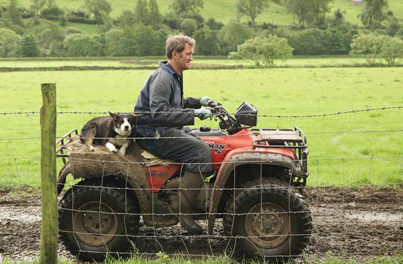 Man on ATV in the Mud