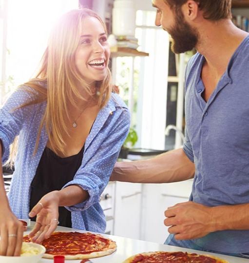 couple-making-pizza